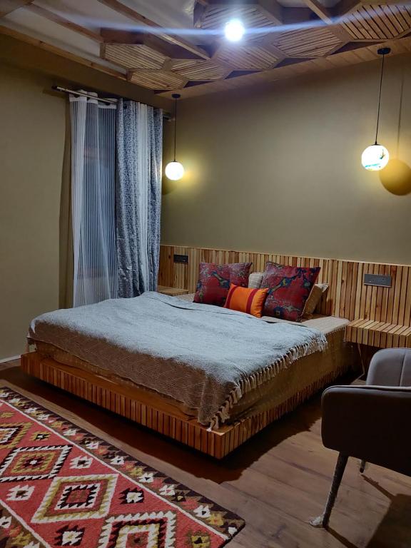 Ένα ή περισσότερα κρεβάτια σε δωμάτιο στο Raangyul Homestay