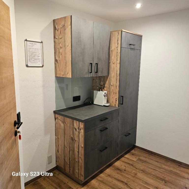 A kitchen or kitchenette at Appartementhaus Eisbauer