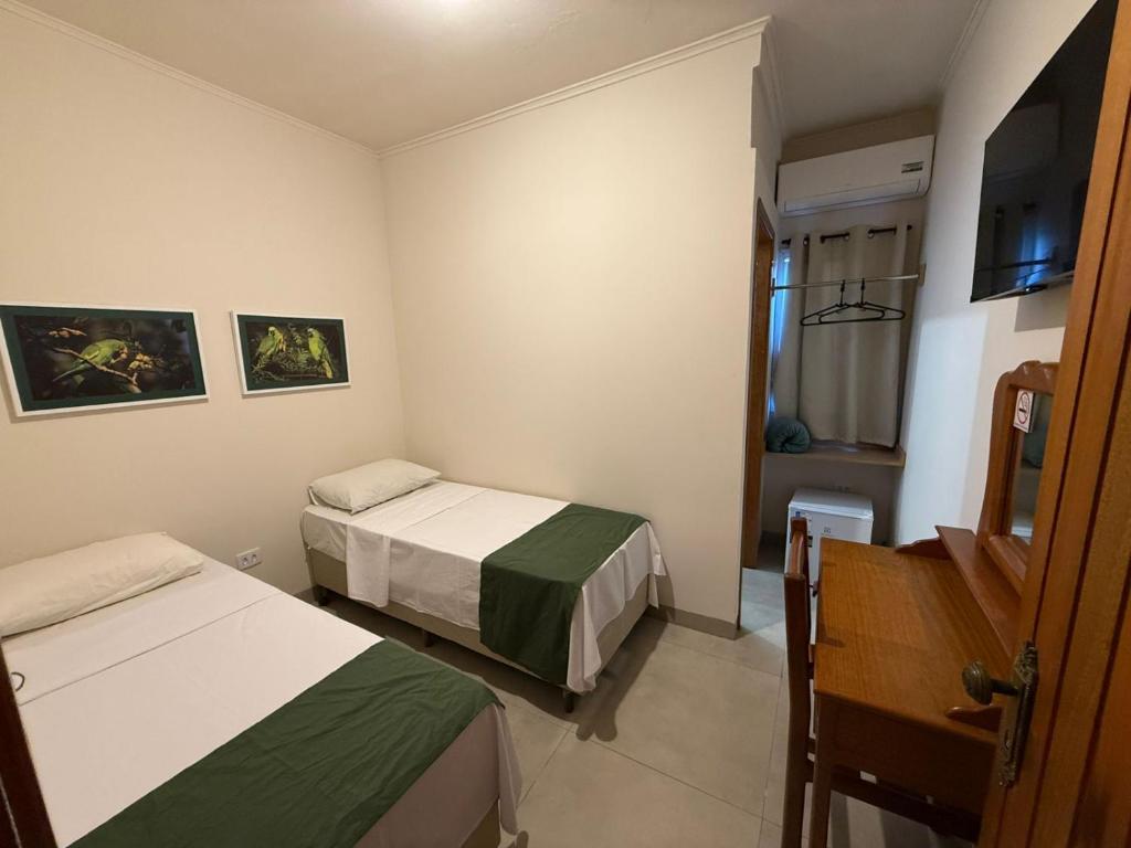 Postel nebo postele na pokoji v ubytování Hotel Santa Catarina