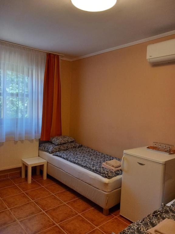 Łóżko lub łóżka w pokoju w obiekcie Karpatia Panzio