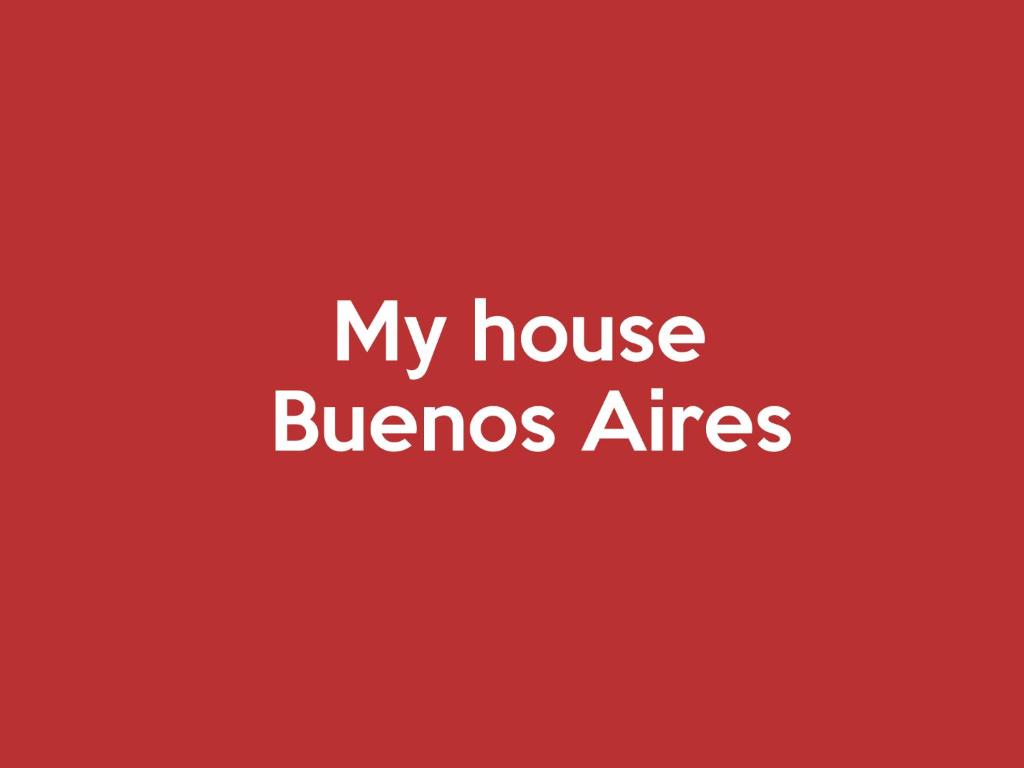 a red sign that says my house buenos aires at My House Buenos Aires in Buenos Aires