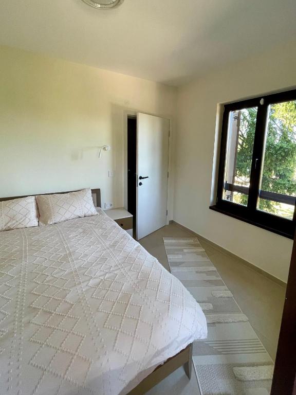 Postel nebo postele na pokoji v ubytování Star Hill Apartments