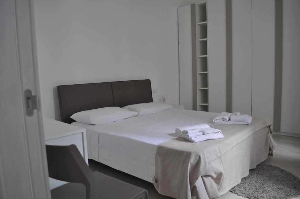 Ένα ή περισσότερα κρεβάτια σε δωμάτιο στο Casa Rosalba