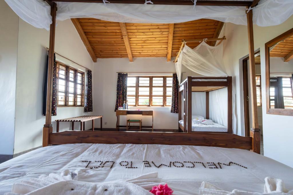 Utengule Coffee Lodge - Camera Familiare Con Vista Sul Giardino