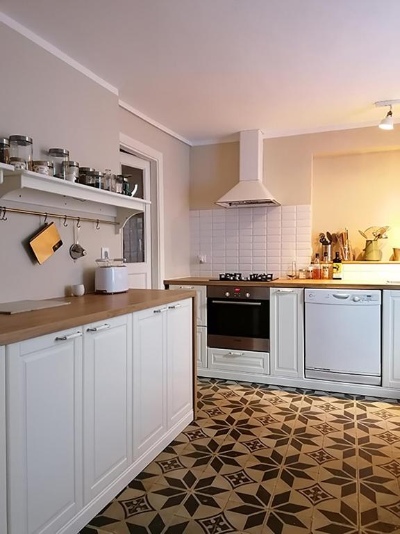 Kuchyň nebo kuchyňský kout v ubytování Autour d'une Toile