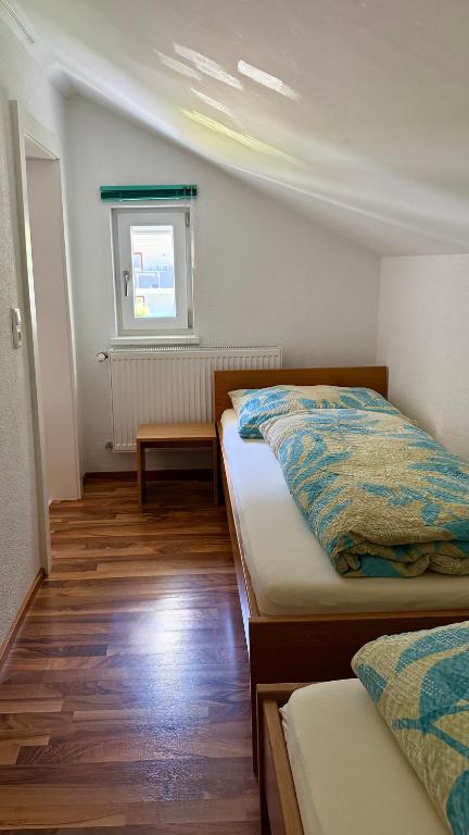 Postel nebo postele na pokoji v ubytování Haus Can