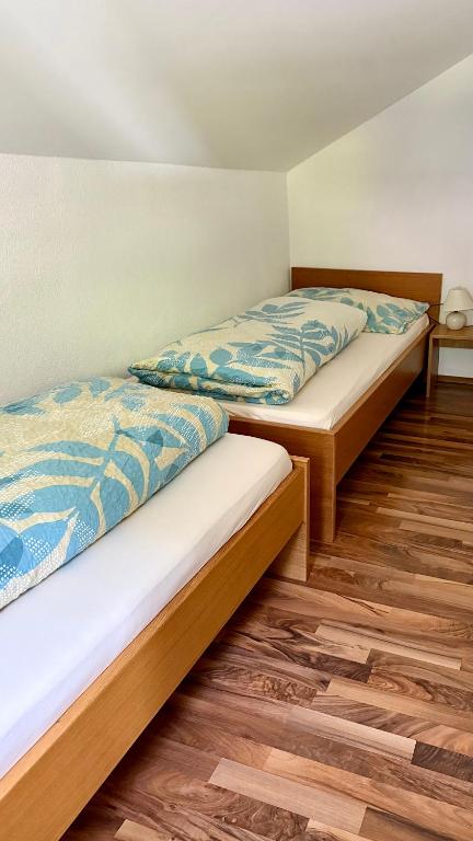 Postel nebo postele na pokoji v ubytování Haus Can