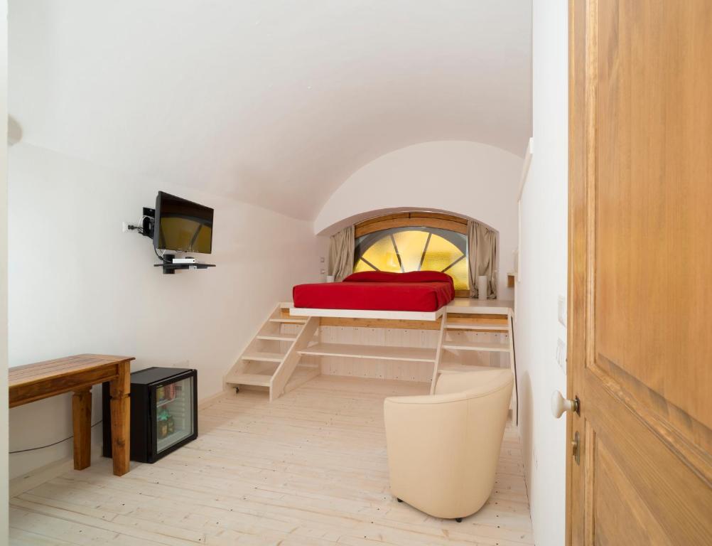 Posteľ alebo postele v izbe v ubytovaní Relais Carlo V - Palazzo Storico