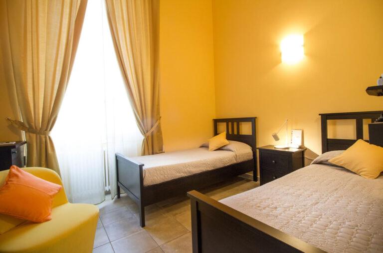 Postel nebo postele na pokoji v ubytování villa Botafogo -