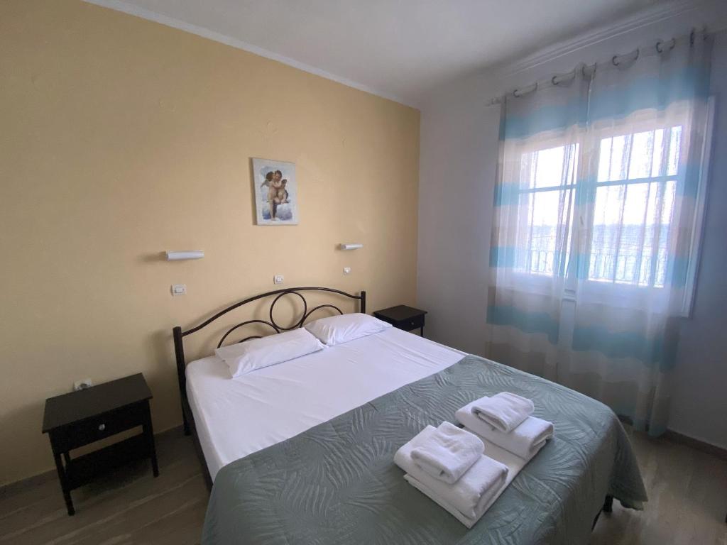 Postel nebo postele na pokoji v ubytování El Greco hotel by Estia