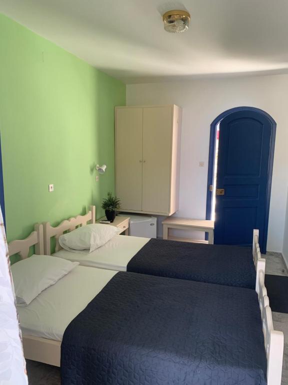 Postel nebo postele na pokoji v ubytování Panorama Hotel