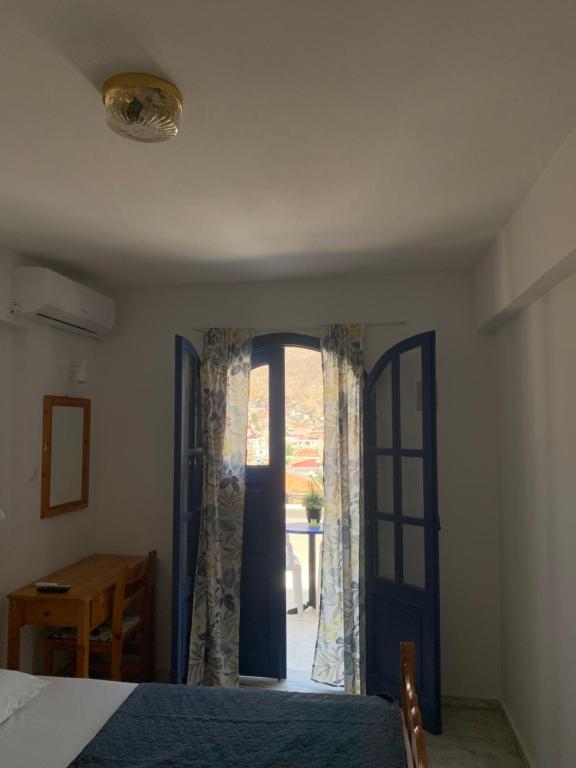 Postel nebo postele na pokoji v ubytování Panorama Hotel