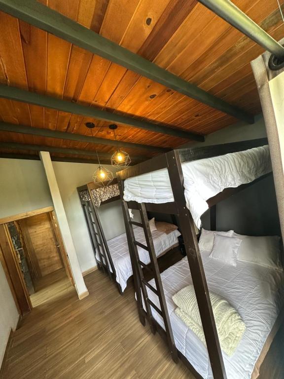 Postel nebo postele na pokoji v ubytování Cabaña DAGO
