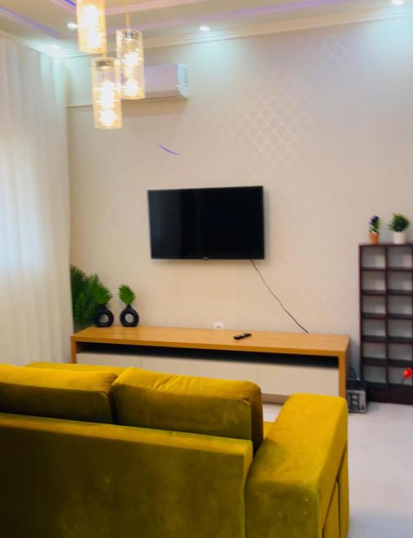 TV a/nebo společenská místnost v ubytování Duplex tx4
