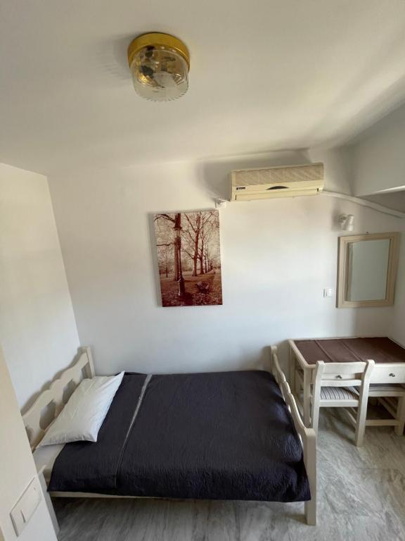 Postel nebo postele na pokoji v ubytování Panorama Hotel