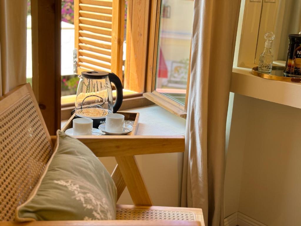 Posezení v ubytování Old Town Suites Muradie