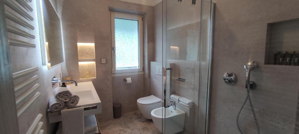 Koupelna v ubytování Apartments Giovannini