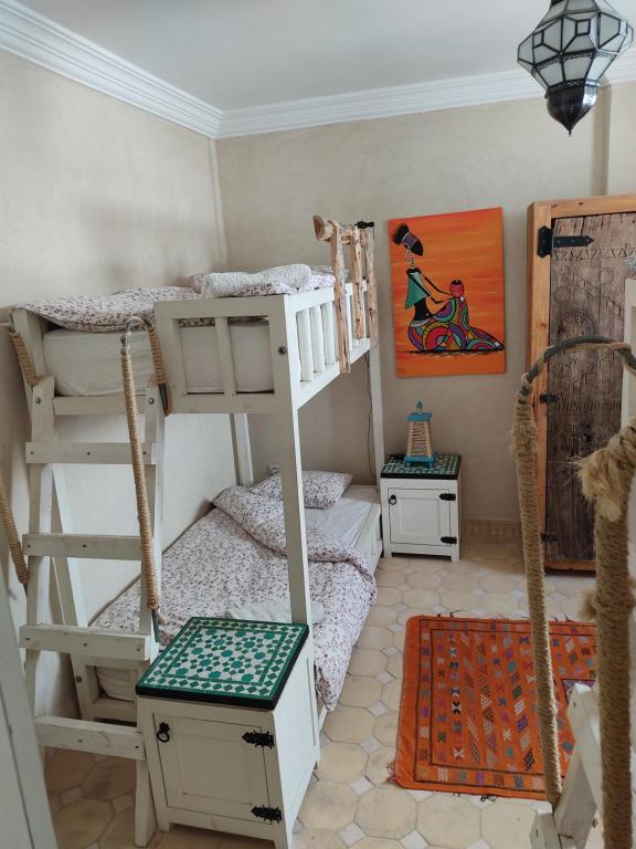 Voodi või voodid majutusasutuse Taghazout Ocean View toas