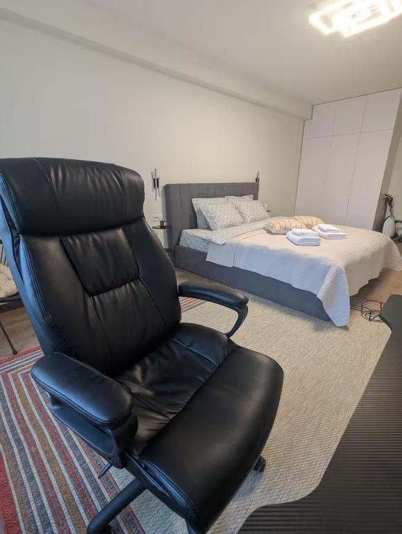 Postel nebo postele na pokoji v ubytování Central stylish apartment