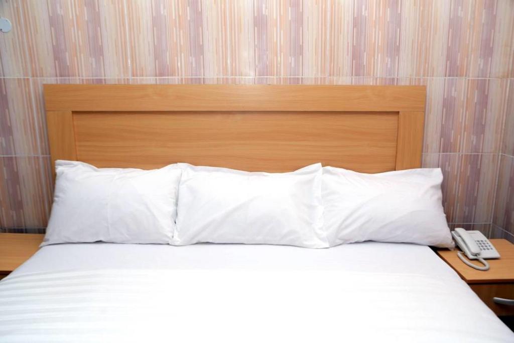 Postel nebo postele na pokoji v ubytování Dilida Hotel