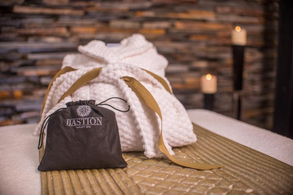 Postel nebo postele na pokoji v ubytování Bastión Luxury Hotel