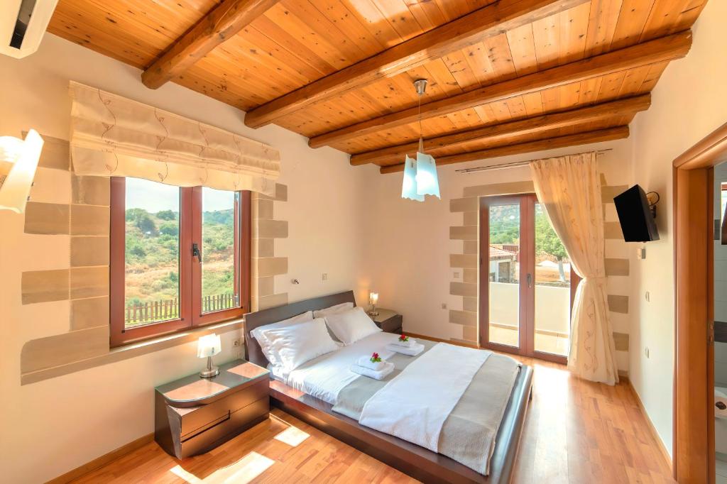 Postel nebo postele na pokoji v ubytování Cretan Dream Villa