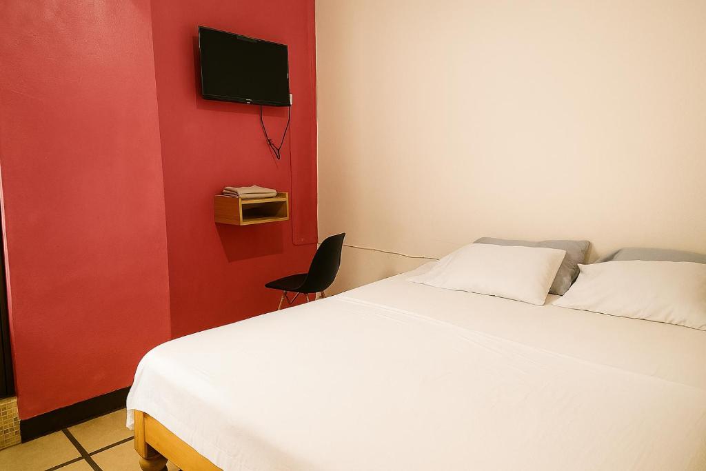 TV a/nebo společenská místnost v ubytování Hospedaje Casa Velaz
