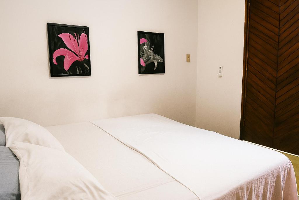 Postel nebo postele na pokoji v ubytování Hospedaje Casa Velaz