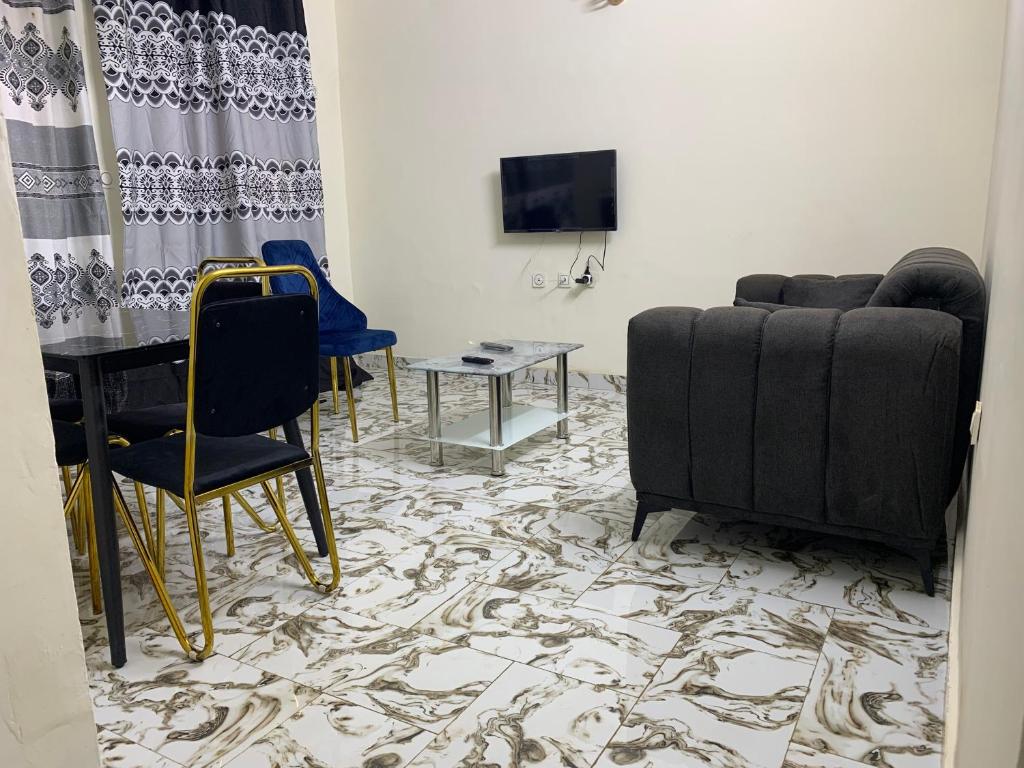 TV a/nebo společenská místnost v ubytování Résidence REHA