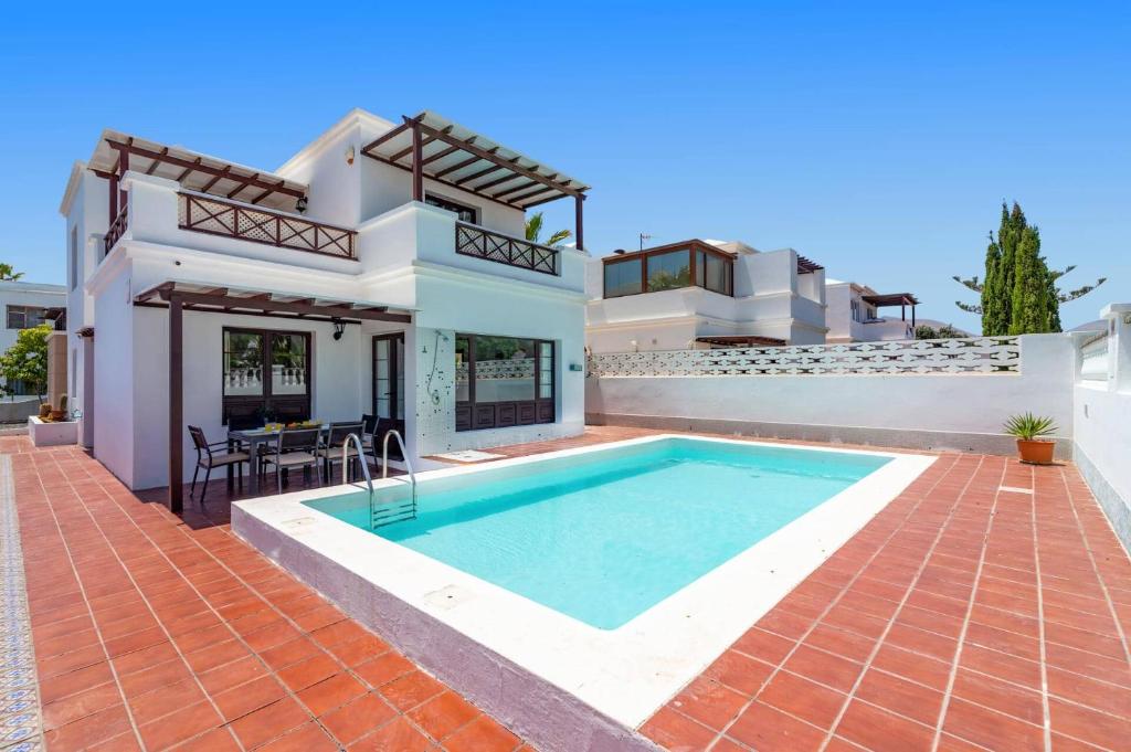 Bazén v ubytování Villa Amapola Pocillos by Villa Plus nebo v jeho okolí
