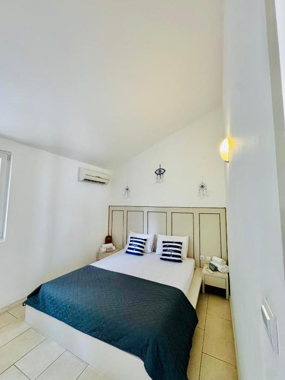 Giường trong phòng chung tại Budva Felix Suites
