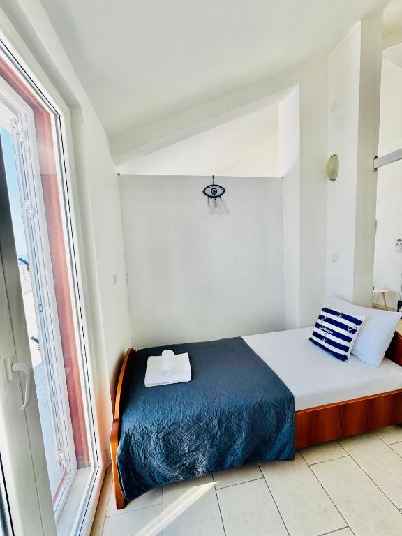 Giường trong phòng chung tại Budva Felix Suites