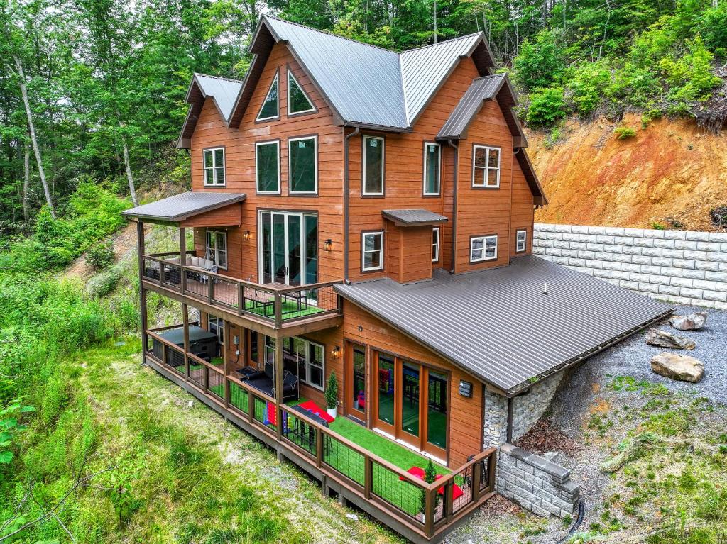 an overhead view of a large wooden house at Heated Pool - Luxury Cabin - Game Room - Theater in Sevierville