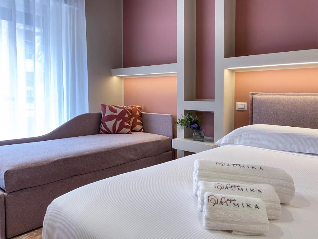 Ένα ή περισσότερα κρεβάτια σε δωμάτιο στο Casa Almika Abate Gimma