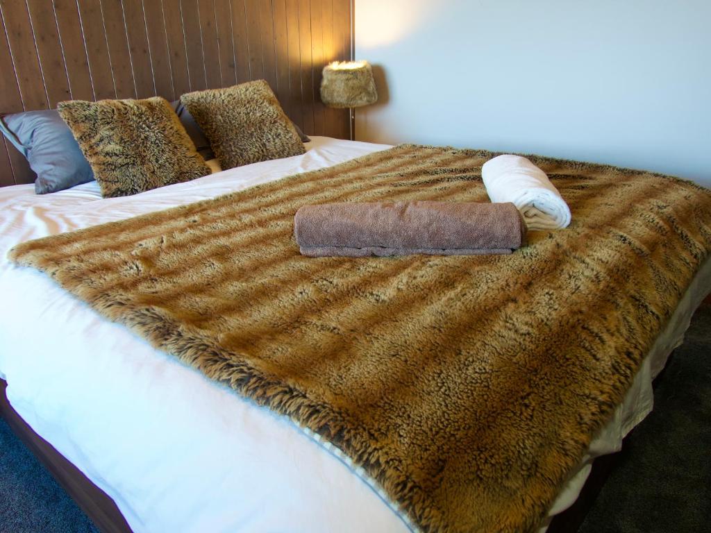 Postel nebo postele na pokoji v ubytování Chalet Calin - Business & Familles