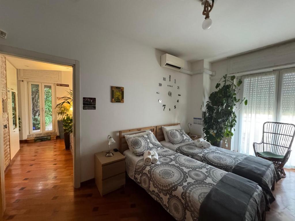 Ένα ή περισσότερα κρεβάτια σε δωμάτιο στο Terrazza Milano Apartment