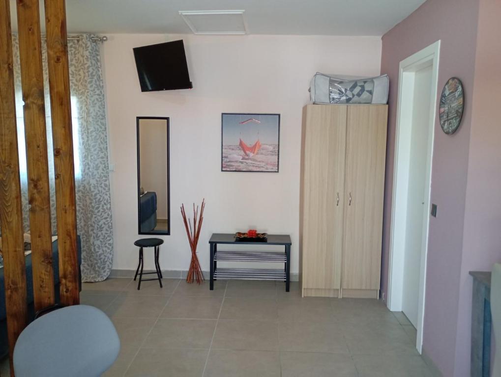 A television and/or entertainment centre at Natasa Studio