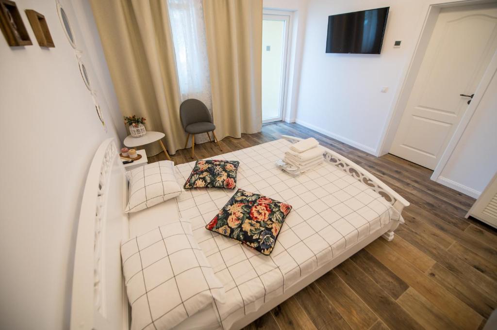 Postel nebo postele na pokoji v ubytování Alma Rezidence