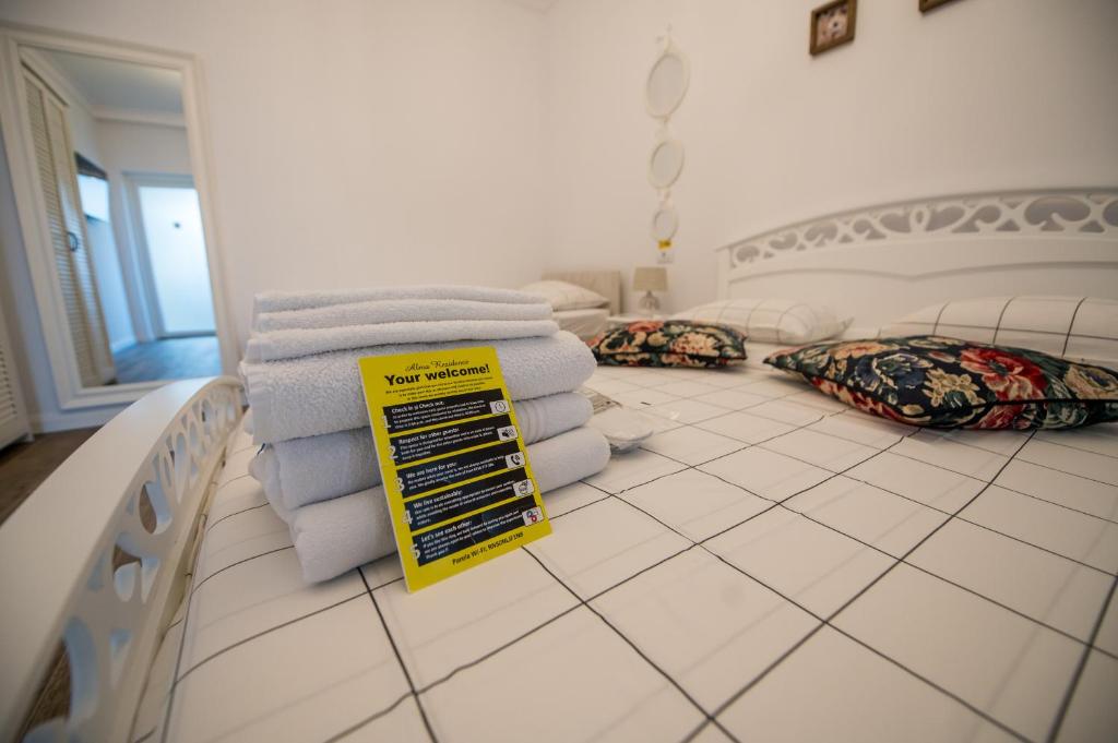 Postel nebo postele na pokoji v ubytování Alma Rezidence
