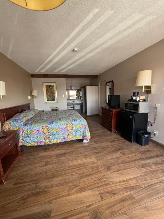 Postel nebo postele na pokoji v ubytování Torch Lite Lodge