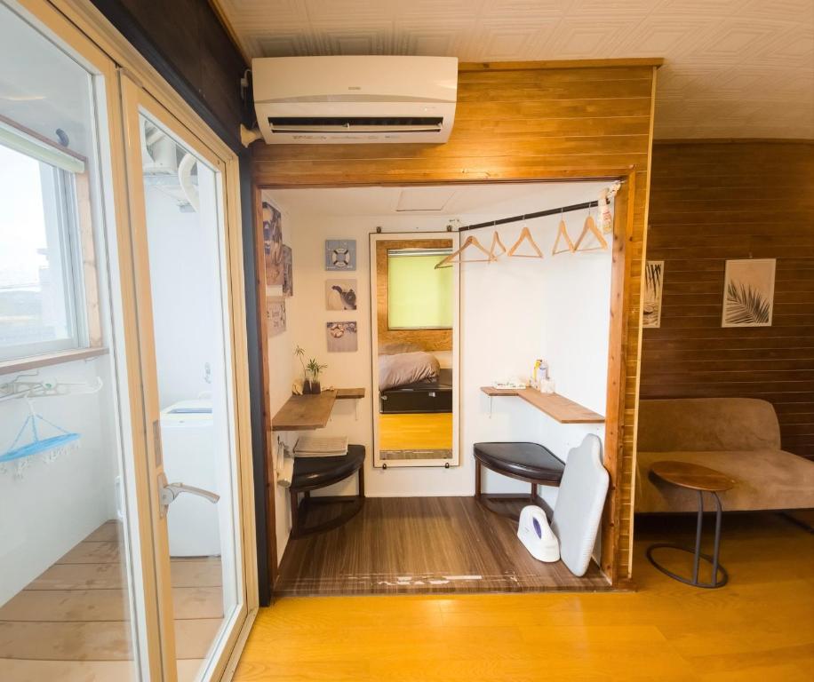 Postel nebo postele na pokoji v ubytování Wivic Awase 4th floor - Vacation STAY 33360v