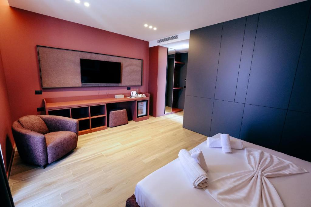 Postel nebo postele na pokoji v ubytování Vila Infinity-Luxury Rooms