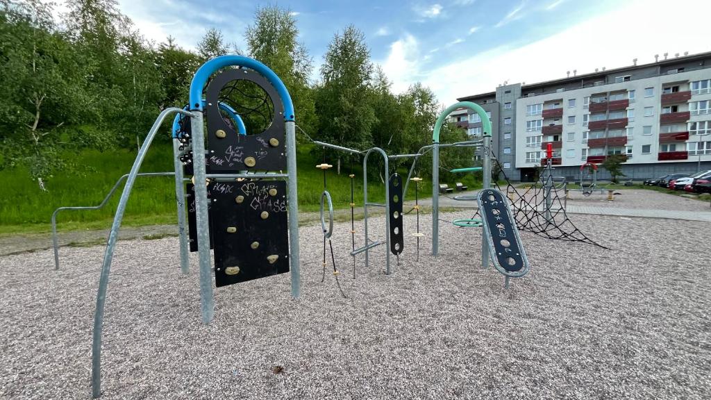 a group of playground equipment in a park at Apartmán Any Vrchlabí in Vrchlabí
