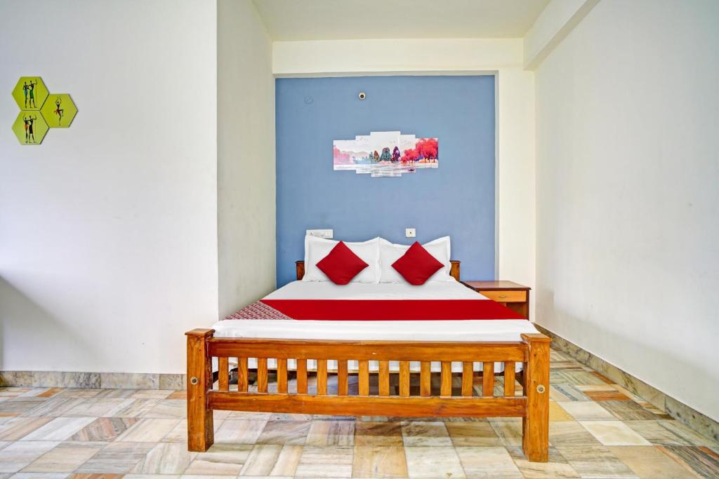 Postel nebo postele na pokoji v ubytování Hotel O Highway Inn