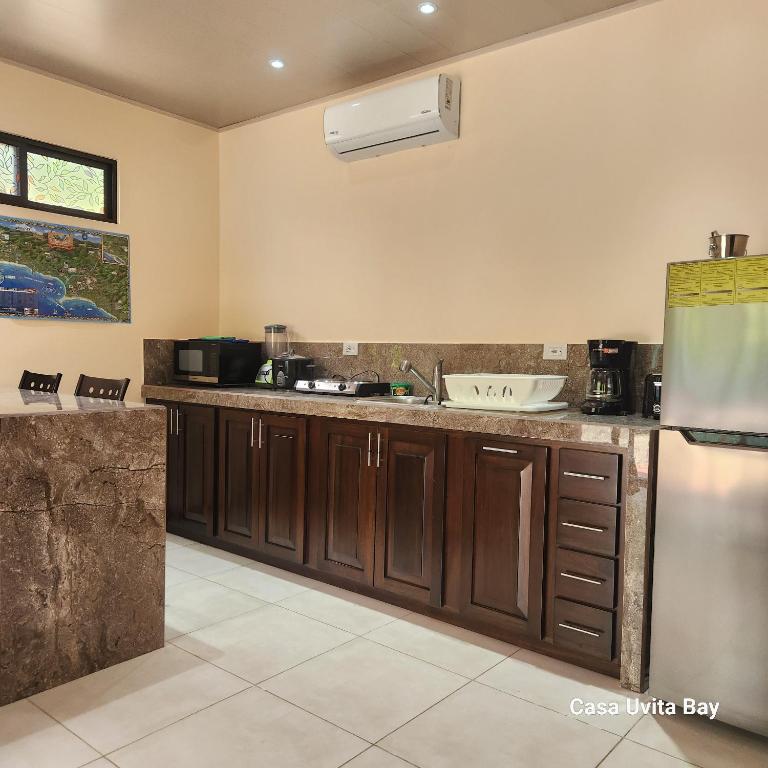 Kuchyň nebo kuchyňský kout v ubytování Casa Uvita Bay
