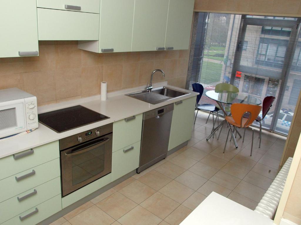 Een keuken of kitchenette bij PR Blanco