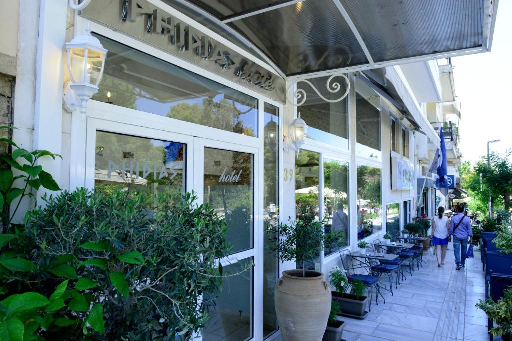 Um restaurante ou outro lugar para comer em Phidias Hotel by Oniro