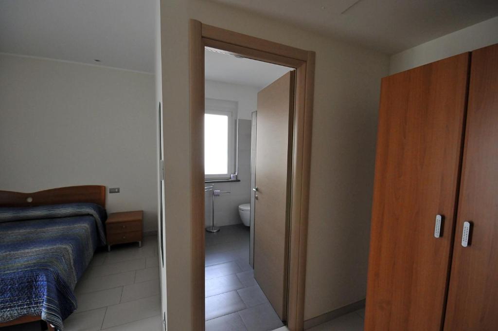 Łóżko lub łóżka w pokoju w obiekcie 7venti