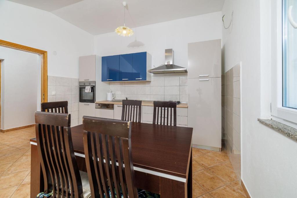 Kuchyňa alebo kuchynka v ubytovaní Apartment Toma