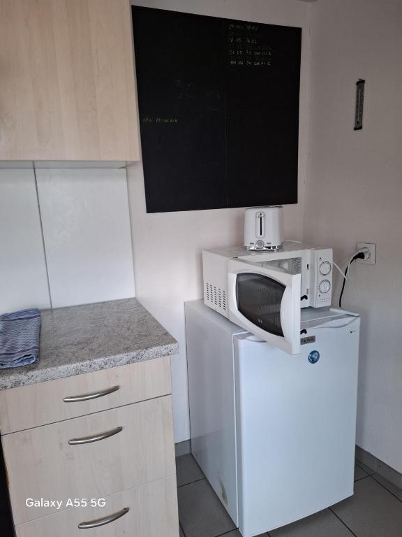 Kuchyň nebo kuchyňský kout v ubytování Zimmer corse 08